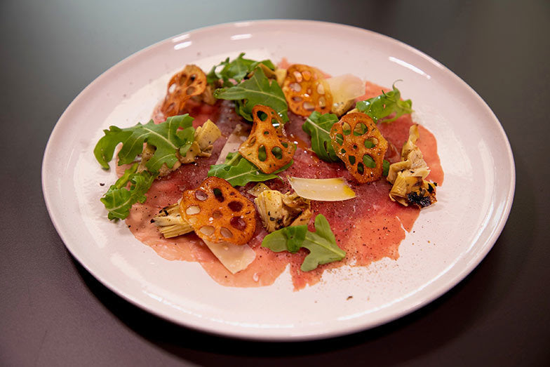 Carpaccio of Beef with Truffle and Artichoke Salad